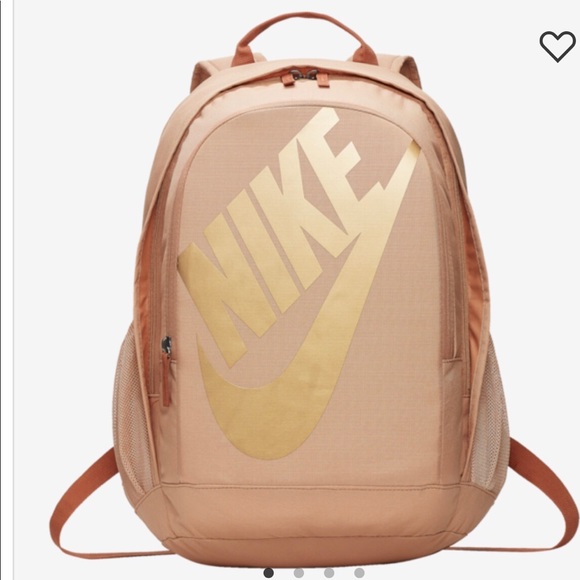 gold nike bag